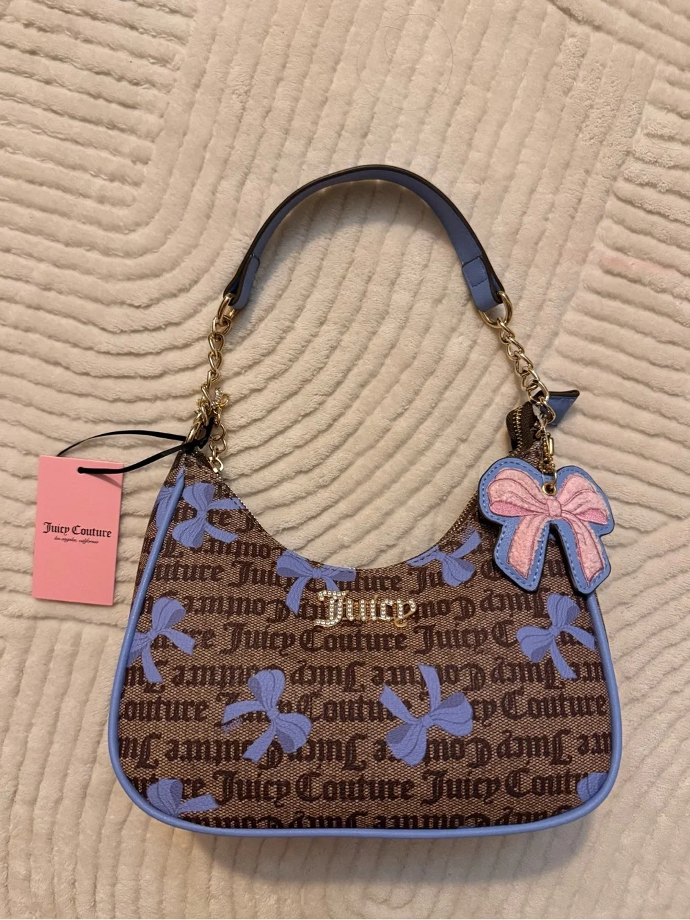 Juicy Couture Brown Monogram Shoulder Bag with Blue Bow Accents